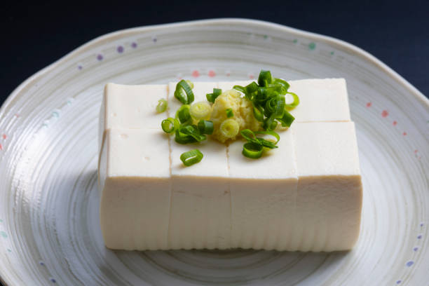 Japanese health food, tofu As a functional food, tofu has health, beauty and longevity benefits. In Japan, it is common to use tofu with long onion and ginger, sprinkle with soy sauce, and eat as it is. oligosaccharide stock pictures, royalty-free photos & images