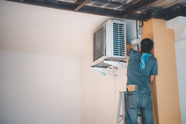 istock Cleaning air conditioner by water for clean a dust 1219670378