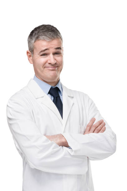 istock Sceptical doctor smiling at camera with cynicism 1219671723