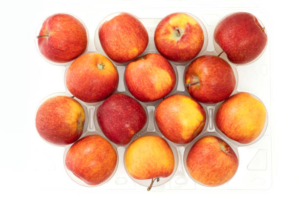 istock Fresh red apples close up on white background, view from above. 1219672821
