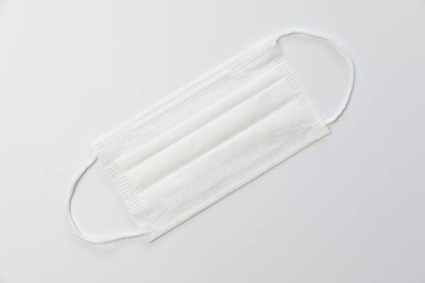 istock Medical mask on gray background 1219676832