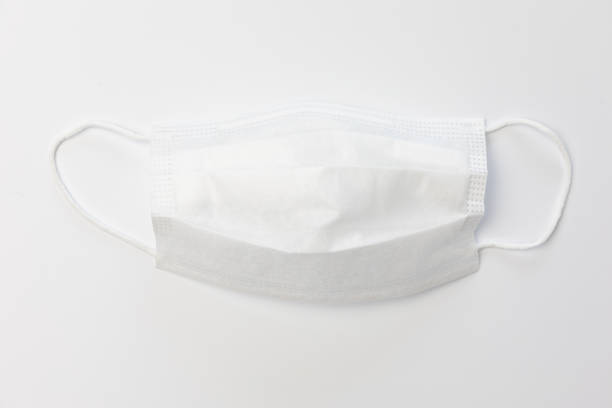 istock Medical mask on gray background 1219676890