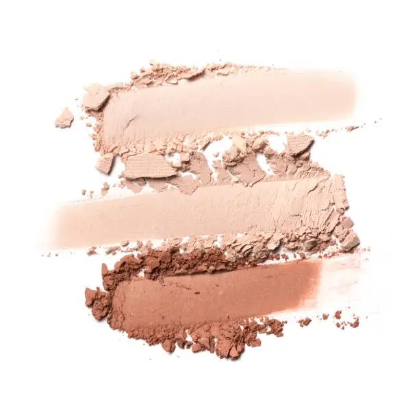 Photo of Brush strokes of crushed light beige and brown eye shadow
