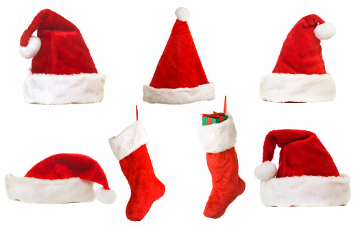 Variety of Christmas decorations cut out on white background