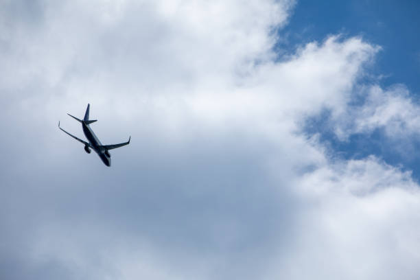 istock airplane in sky travel concept 1219680346