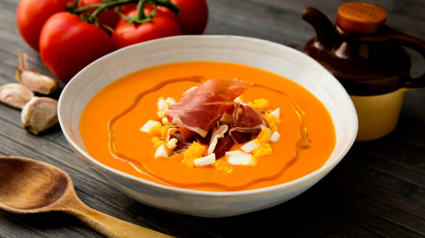 istock Traditional Spanish salmorejo. Cold tomato soup served with egg and iberico jam. 1219682536