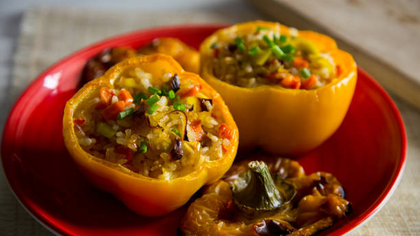 Stuffed paprikas with cuscus and vegetables Stuffed paprikas with cuscus and vegetables hungarian pepper stock pictures, royalty-free photos & images