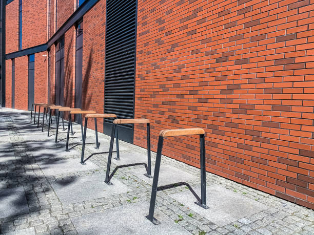 istock bicycle parking near the brick wall.  city ​​view. 1219685600