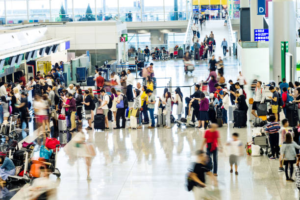 istock Crowd of people waiting for check-in 1219689017
