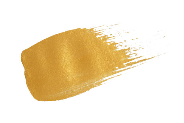 istock gold texture paint stain on white background 1219689184