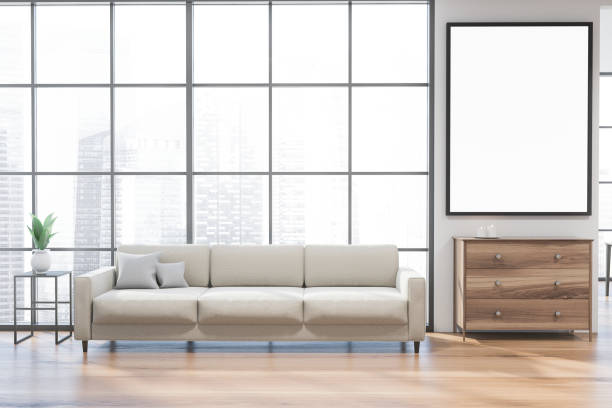 istock White living room with sofa and poster 1219689267