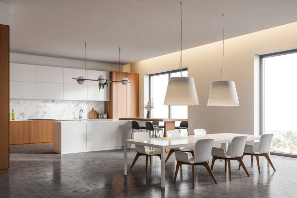 istock White and wooden kitchen corner with table and bar 1219691926