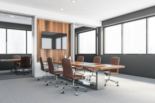 istock White and grey conference room corner with TV 1219691942