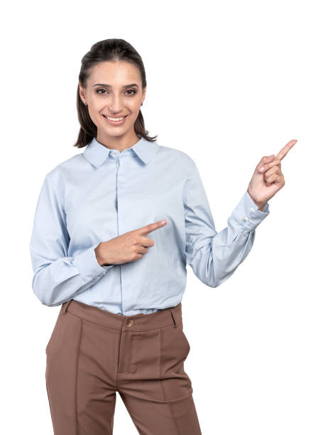 istock Smiling businesswoman pointing sideways, isolated 1219692081