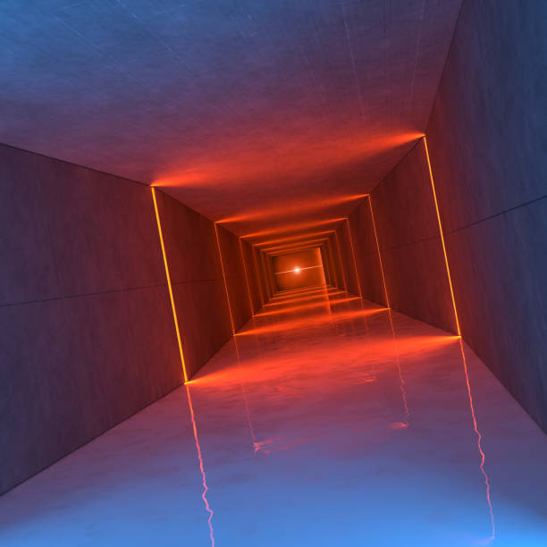 istock Futuristic empty tunnel illuminated by blue and orange lights 1219693283