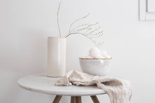 istock Rustic bowl of raw chicken eggs. Easter minimalism concept 1219695710