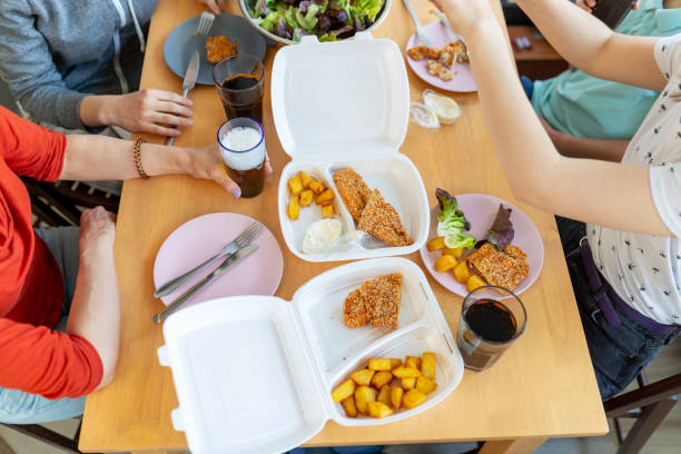 istock Family having delivered meal during covid-19 outbreak 1219697160