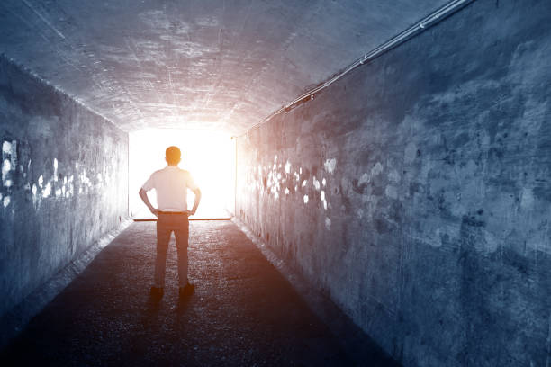 istock Men standing in the tunnel 1219699220