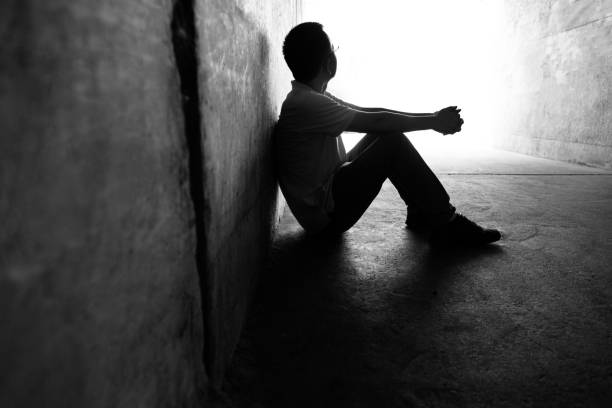 istock Desperate man sitting in the tunnel 1219699233