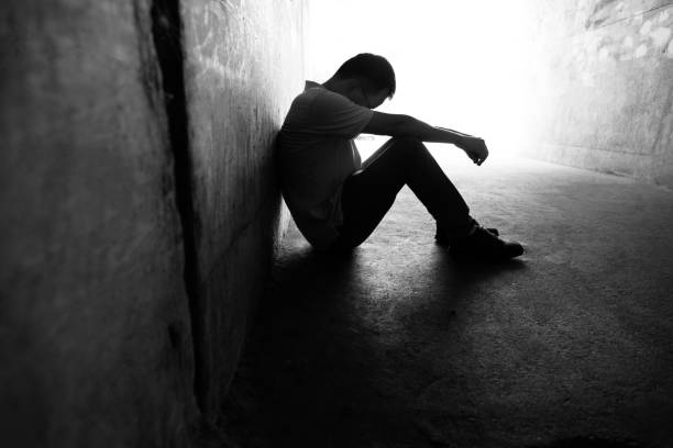 istock Desperate man sitting in the tunnel 1219699431