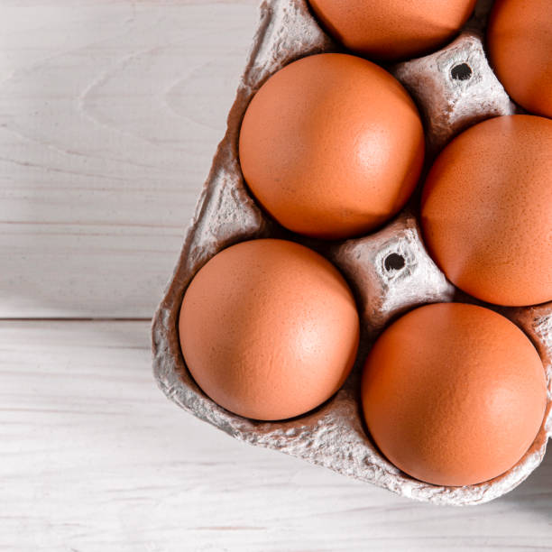 istock Large brown chicken eggs lie in an eco-friendly cardboard egg tray 1219701933