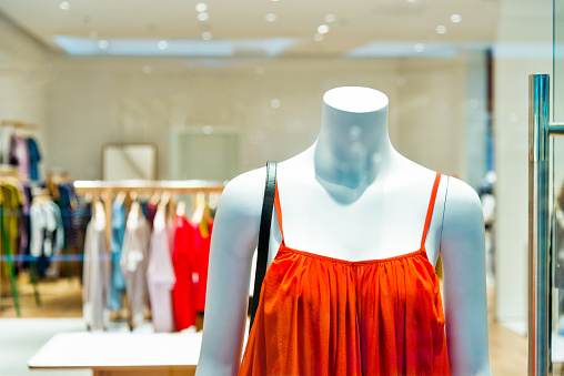 Woman mannequins in clothing store.