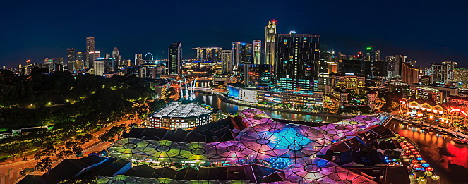 Panoramic view of Singapore at night overlooking Clark Quay, Marina and business district photographed from elevated position in March 2015