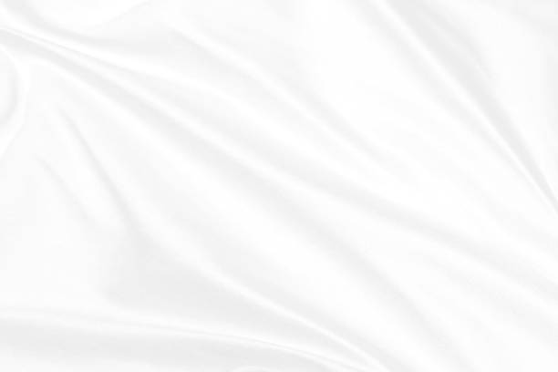 istock Clean woven decorative fashion textile soft fabric white abstract smooth curve shape background 1219707123