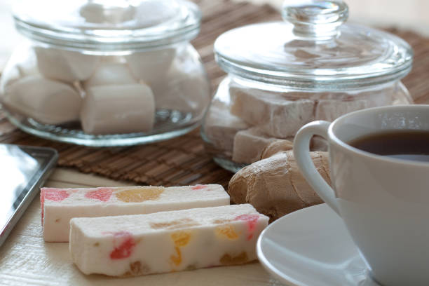 istock homemade cozy tea with ginger and sweets such as marshmallows, Turkish delight and marshmallows with colorful marmalade 1219707967