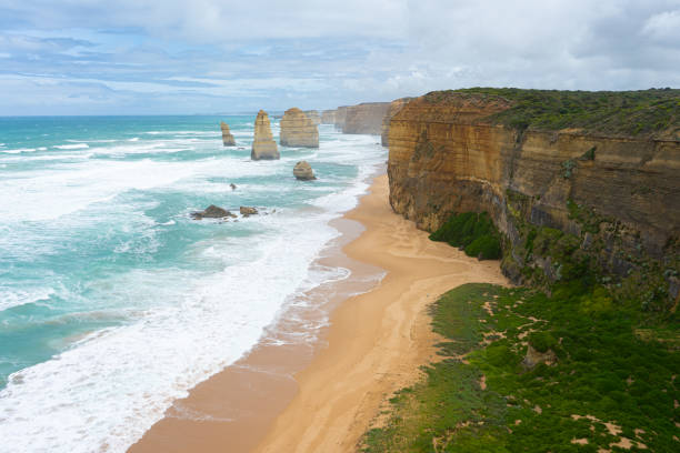 istock Limestone cliffs and beach landscape, 12 Apostles, Victoria 1219708279