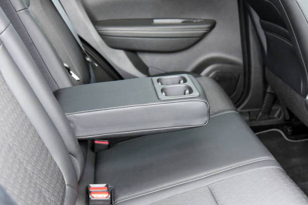 istock armrest in the car with cup holder for rear seats row 1219709346