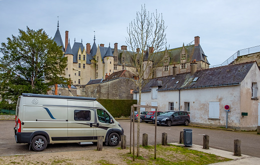 Campervan at  Chateaux Langeais, France  - February 20, 2020:  camping in the village near the famous medieval castle