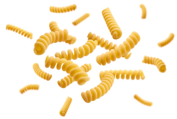 istock Italian pasta levitating on a white background 1219713448