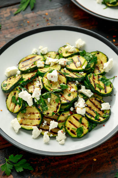 istock Warm salad with grilled zucchini, garlic and herbs 1219713723