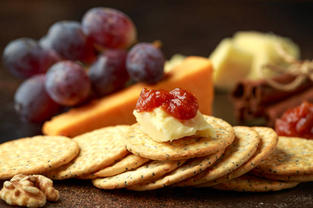 istock stack of crackers with apple chutney and other snacks 1219713875