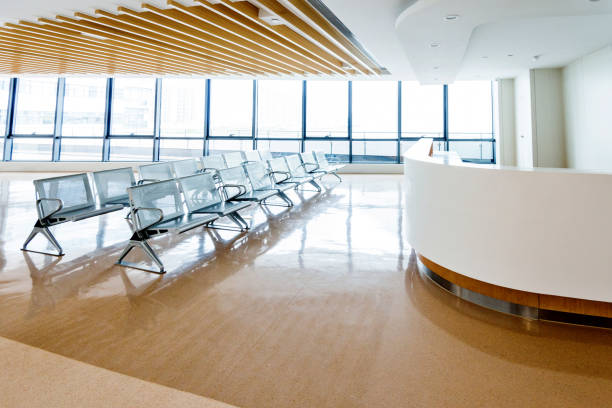istock Empty seats in hospital waiting room 1219714059