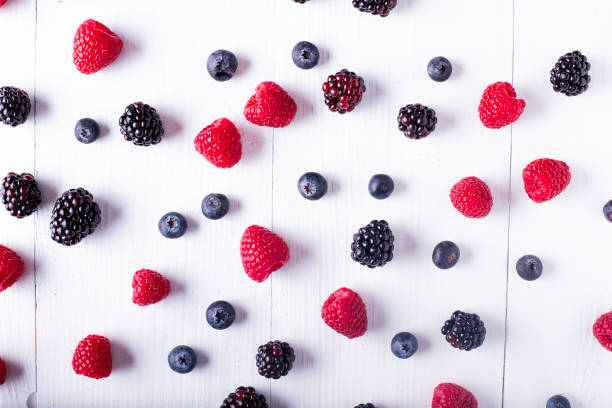 istock group of blackberries, raspberries and blueberries 1219715392