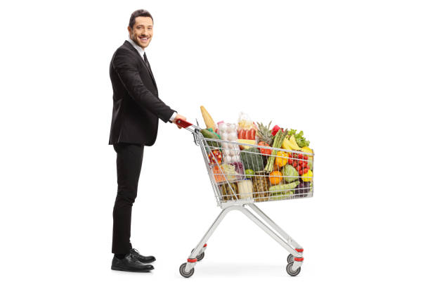 istock Businessman with a shopping cart 1219716015