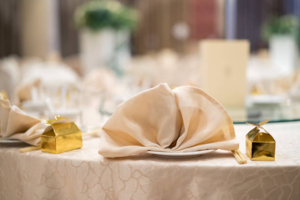 Wedding reception dining table decoration in banquet hall