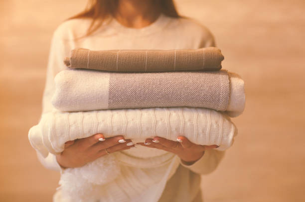 istock Crop woman with warm blankets 1219716296
