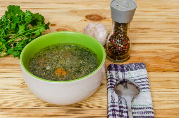 istock Chicken soup in a bowl on a napkin. 1219716365