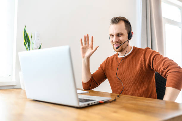 istock The guy uses hands-free headsets to work from home 1219719039