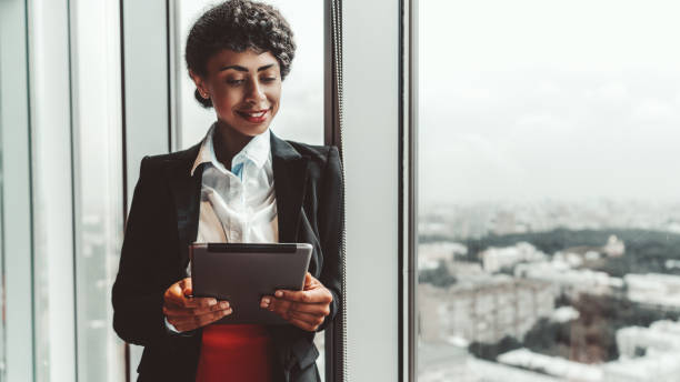 istock A businesswoman with a tablet pc 1219720039
