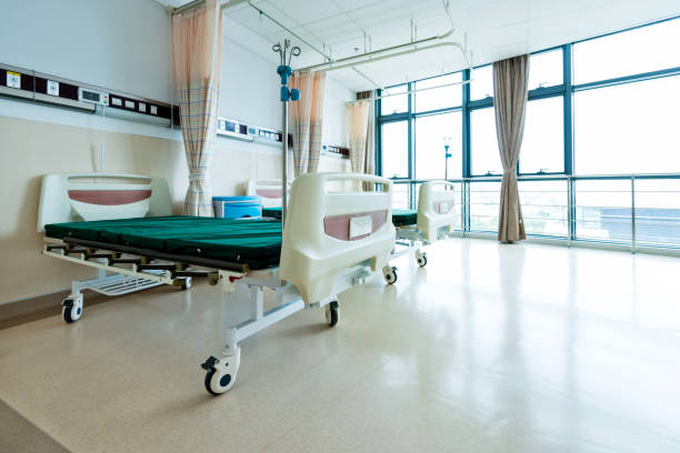 istock Hospital ward with beds and tables 1219725142