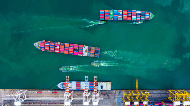 istock Aerial view container cargo ship at sea port, Business industry commerce global import export logistic transportation oversea worldwide, Sea shipping company vessel. 1219727549