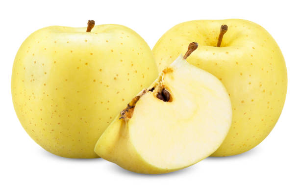 istock yellow apple isolated on white clipping path 1219728750