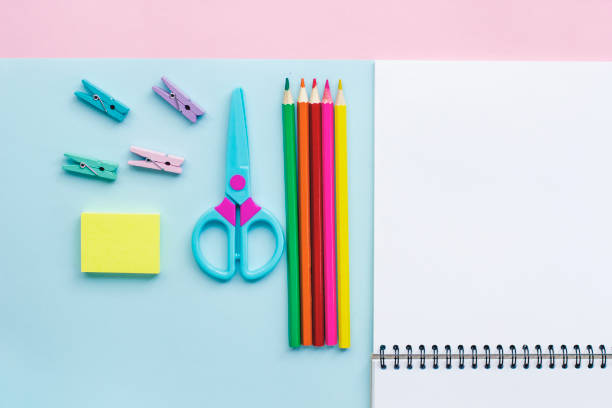 istock Office supplies on a pink and blue background. Work at home. 1219729023