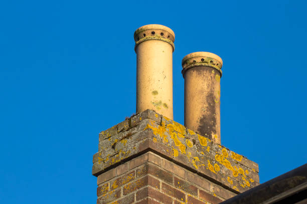 istock Chimney pots on Victorian era houses 1219729045