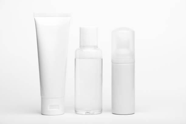 istock Container for cream, shampoo, toiletry. Unbranded plastic tube and flacons. Bottle with dispenser for cosmetics products. Skincare and beauty concept. Mockup style, copy space. Isolated on white 1219730198
