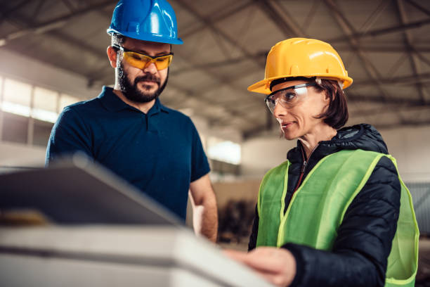 istock Workplace safety inspector at industrial factory 1219730203
